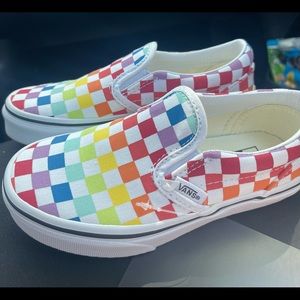 Multicolored slip on Van’s. Never Worn. New in Box.